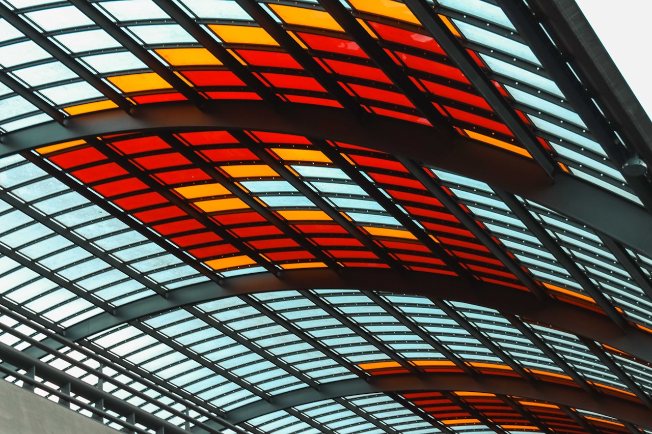 Colorful stained glass ceiling with a modern design.
